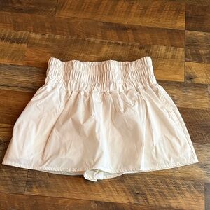 Her entire name says..Grace Women's White Smocked Waist Skort with pockets